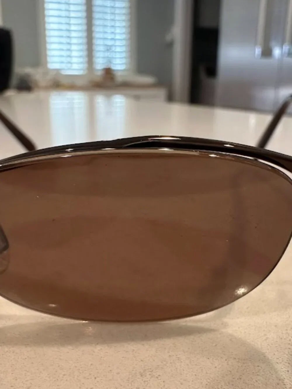 Maui Jim Brown Lens Oval Sunglasses with Gold Nose Pads and Dark Brown Frame